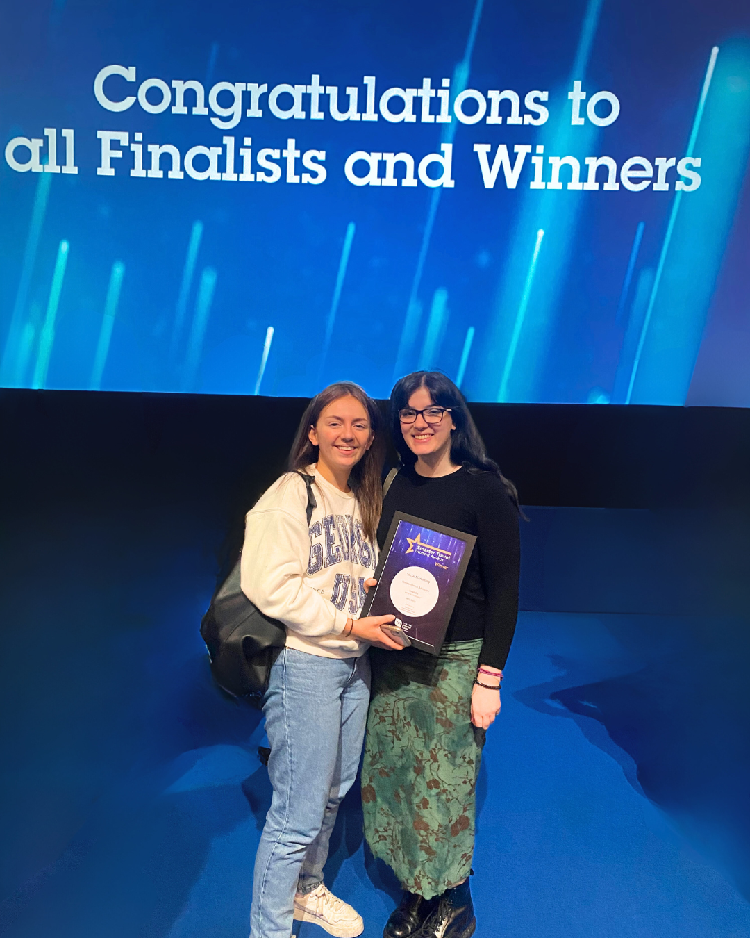 Smarter Travel Awards accepting award